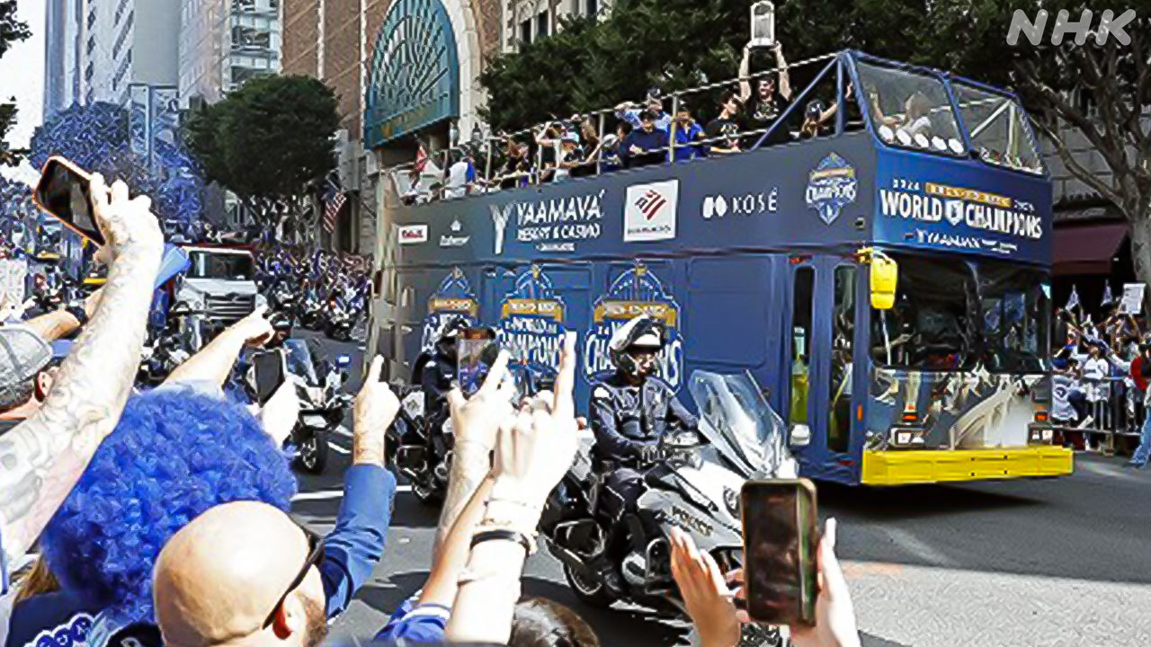 The dodgers, the champions of major league baseball, parade in Los Angeles