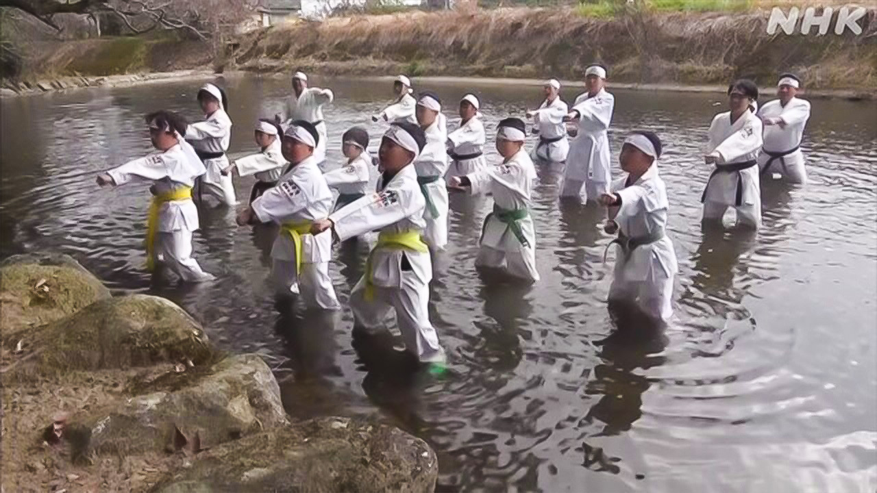 Fukuoka Prefecture Children Practice Karate in a Cold River