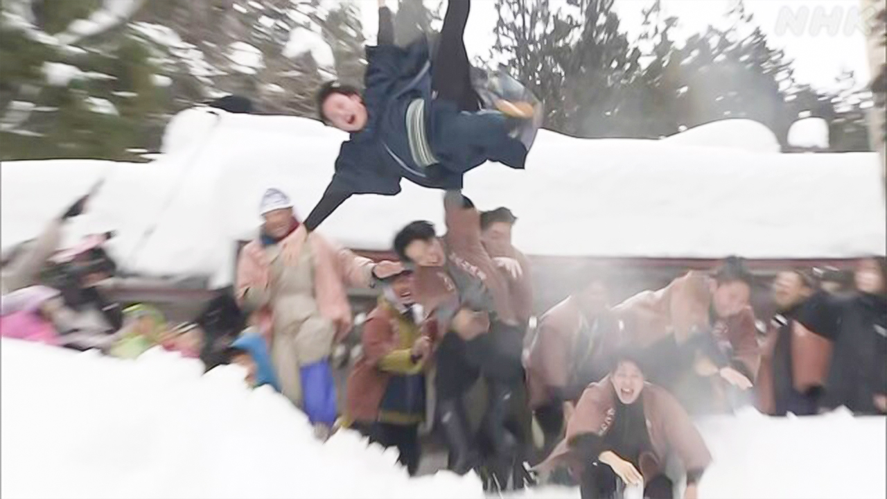Niigata Prefecture Celebrates by throwing a newly married man in the snow
