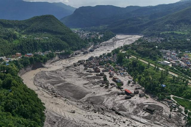 Large-scale debris flow in Nepal: glacier collapses, forms dam lake, and may have burst.